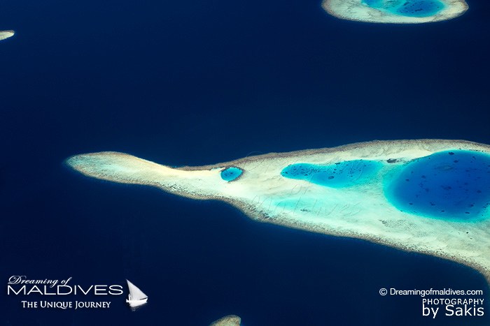 Photo of Maldives - Aerial View of the Maldives Islands. Fish Shape