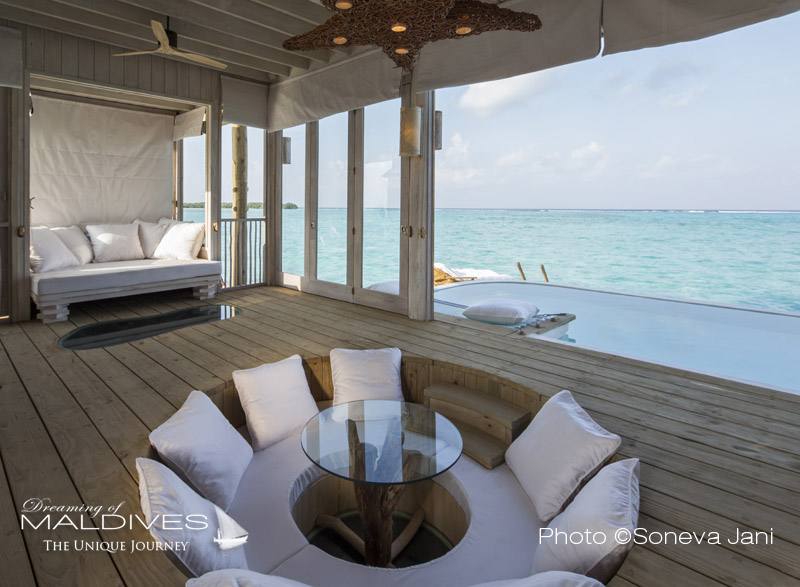 Soneva Jani water villa lounge and dining are
