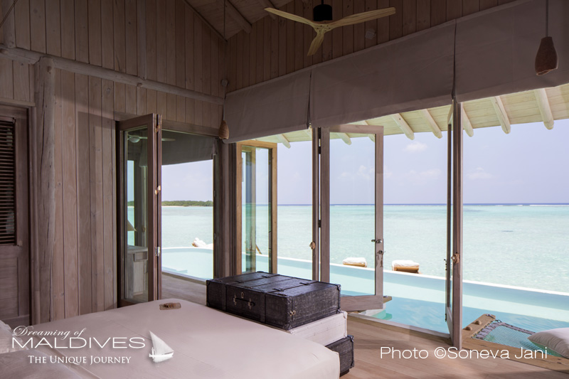 Soneva Jani water villa master bedroom with lagoon view