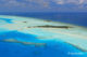 Photo aérienne des Maldives - Ile-Hotel avec recif et banc de sable