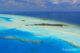 photo-aerienne-maldives-4 Photo aérienne des Maldives - Ile-Hotel avec recif et banc de sable