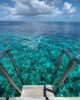 Snorkeling sur les récifs de Kudadoo Maldives depuis votre villa sur pilotis