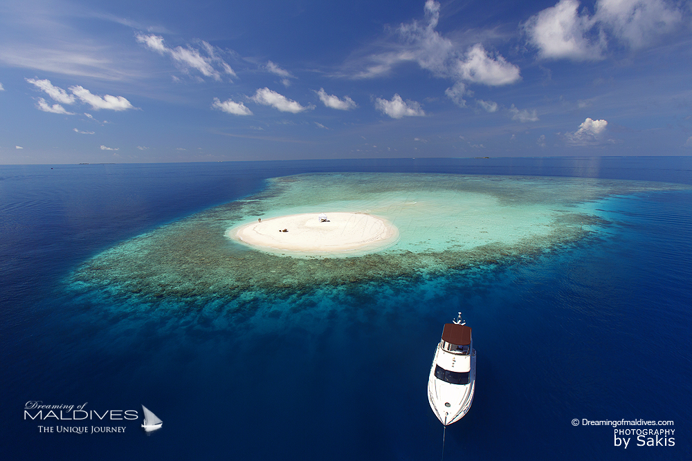 Baros Maldives Diner sur Le banc de sable privé de l'hôtel