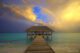 rainbow sunset in Maldives during rainy season monsoon