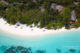 Baros Maldives beach villas with snorkeling access
