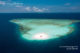 Baros Maldives private snorkeling on sandbank aerial view