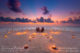 romantic sunset beach dinner at baros maldives