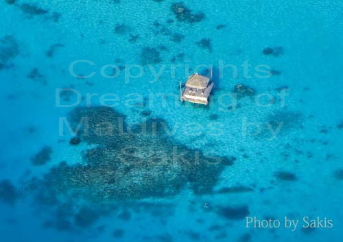 Maldives aerial photo lagoon Maldives aerial photo of a private deck in the lagoon