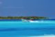 seaplane landing on a reort lagoon in Maldives