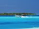 seaplane landing on a reort lagoon in Maldives