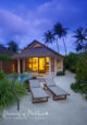 Deluxe Beach Villa with Pool Exterior at sunset