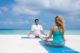 Private Yoga Session on the beach at Finolhu Maldives 