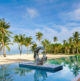 Pullman Maldives Maamutaa design Resort main pool metallic sculpture