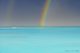 Rainbow over an island in Maldives