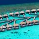 W Water villas located between the lagoon and the island house reefs for direct snorkeling