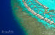 Aerial view at W maldives Fabulous Overwater Oasis and the island house reef drop off for immediate snorkeling 
