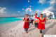 Maldivian women wearing the red traditional Dhivehi Libaas during a wedding ceremony in a resort