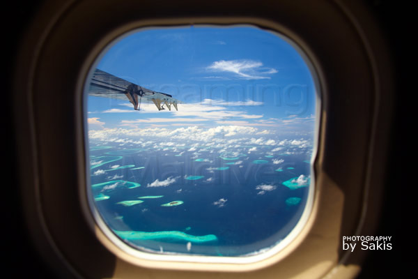 window seat with dreamy aerial view on maldives islands window seat with a dreamy aerial view on the Maldives Islands
