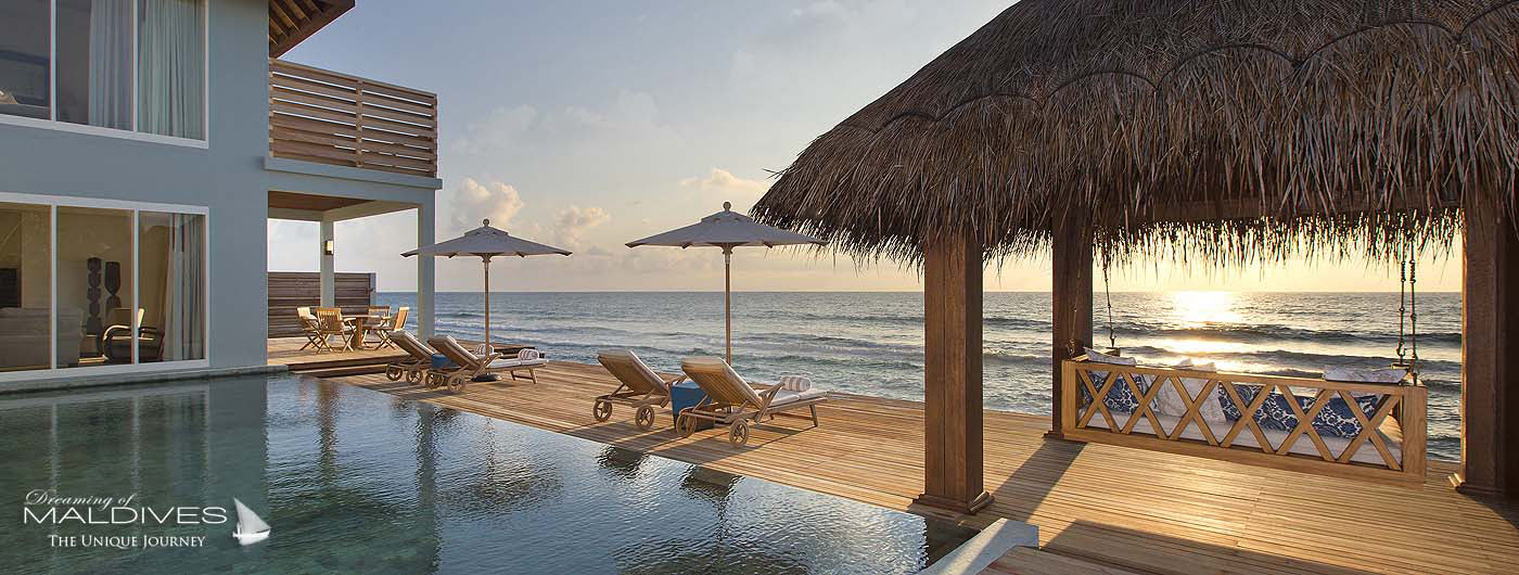 Naladhu Maldives lagoon view from the bathroom