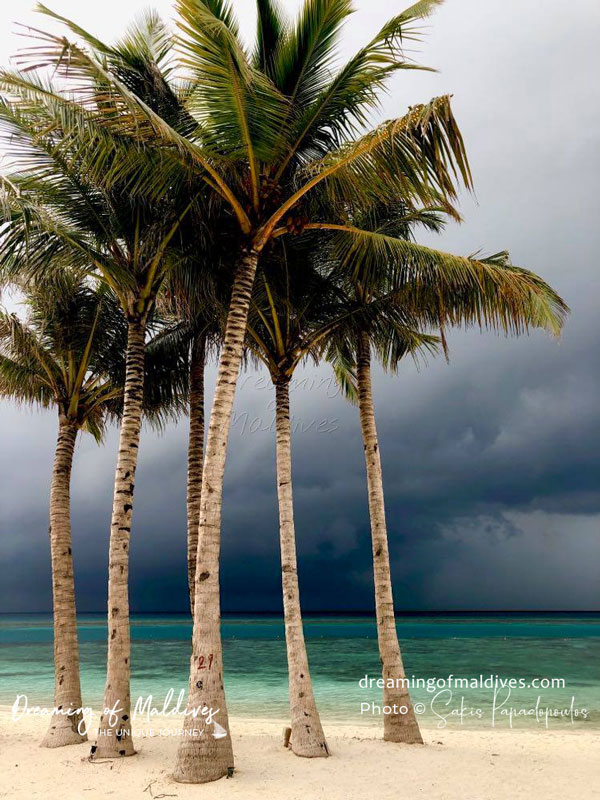 Maldives Coming storm on the beach