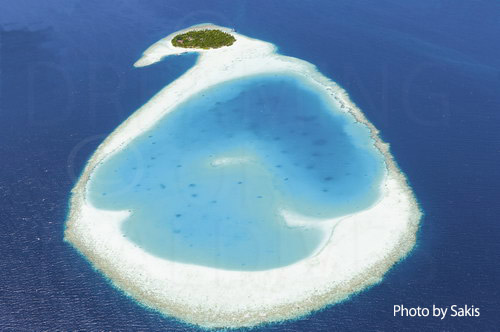 Aerial photography Maldives - Island and her perfect private lagoon