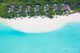 anantara kihavah beach villas aerial view in tropical vegetation
