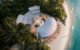 Samana Ocean Views Maldives beach bar architecture with flowing lines structures