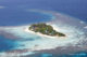 Coco Privé Private Island Maldives Island reefs for snorkeling Aerial View