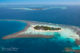 Coco Privé Private Island Maldives Island reefs for snorkeling Aerial View