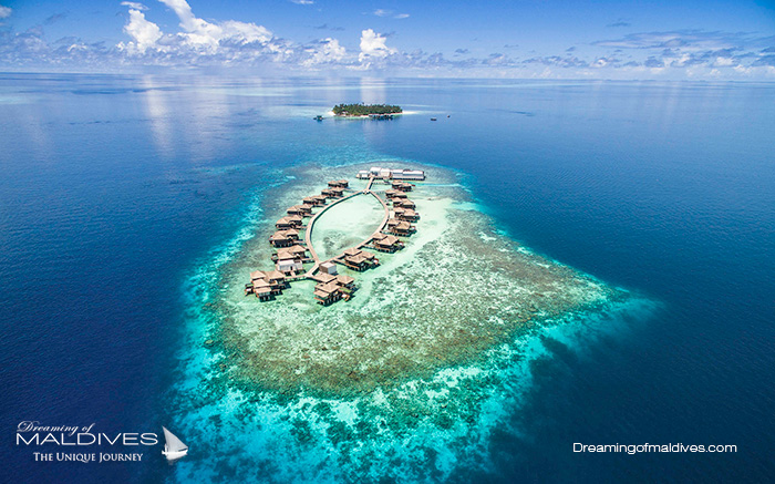 Dhevanafushi Maldives Best Resort for snorkeling in Maldives.Aerial View reef
