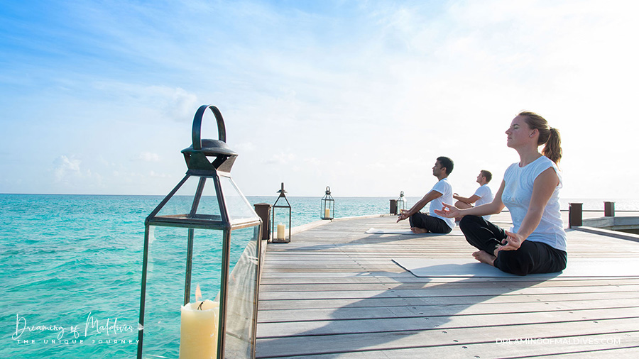 Group yoga session at Hideaway Maldives