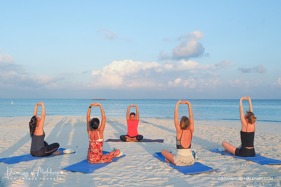 best resort maldives yoga free group session Vakkaru Maldives beach