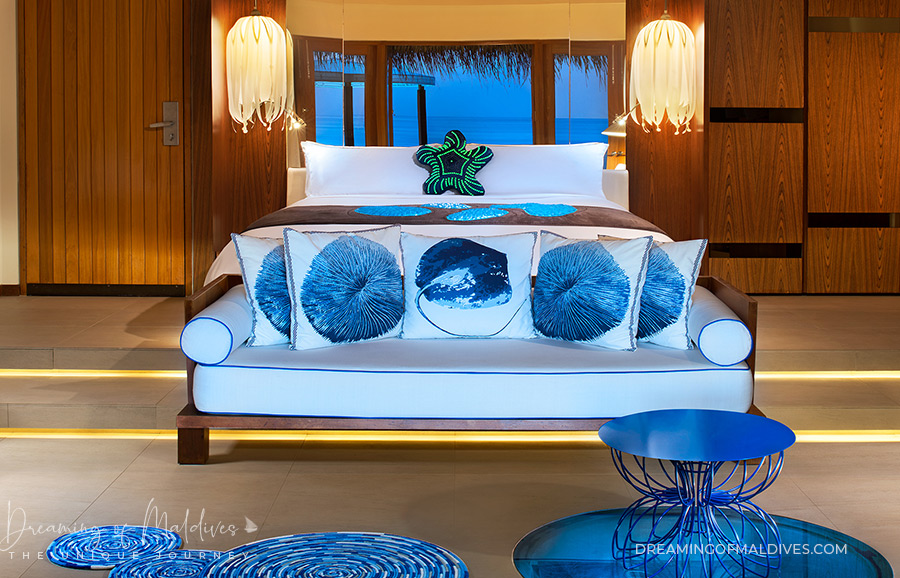 W maldives interior design glowing starfish pillow, Signature pillows and medusa bedside lights in the Fabulous Ocean Oasis
