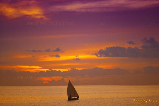 Maldives dhoni at sunset. A perfect Show. Colors everywhere like a painting