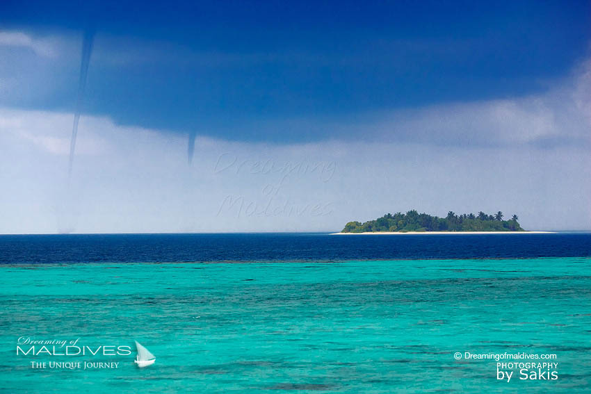 double waterspouts in maldives during a local storm