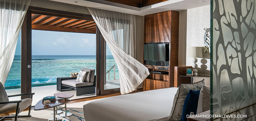 Review The Two-Bedroom Ocean Pavilion with Pool Master Bedroom