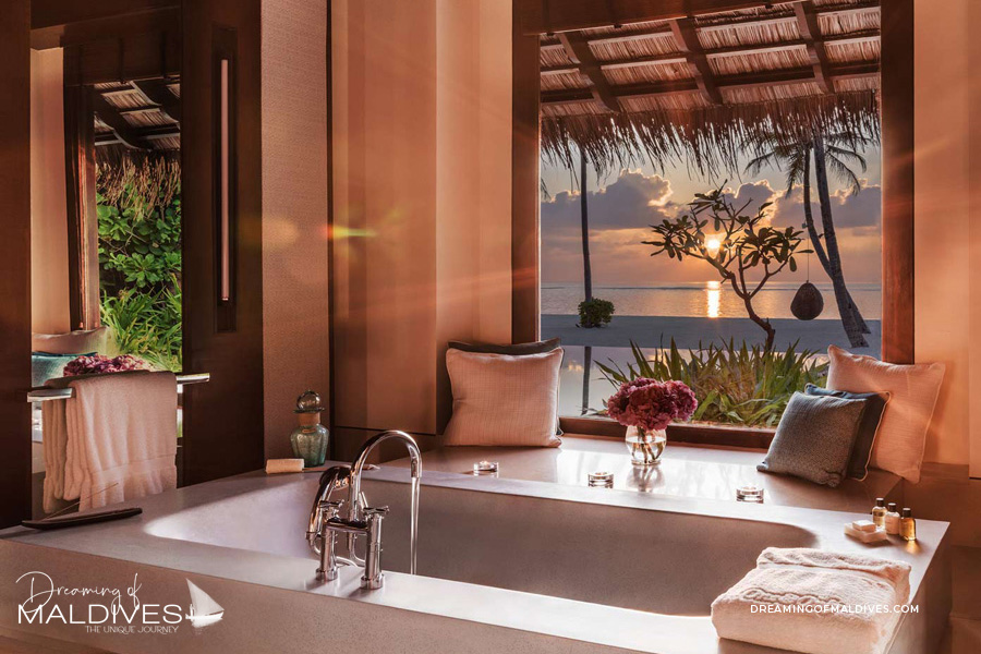 Bathroom with views at the Beach, the ocean and the Sunset at One & Only Reethi Rah Grand Sunset Residence maldives