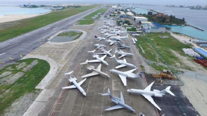 Busy Tarmac at Velana Airport. Private Jets are legion.