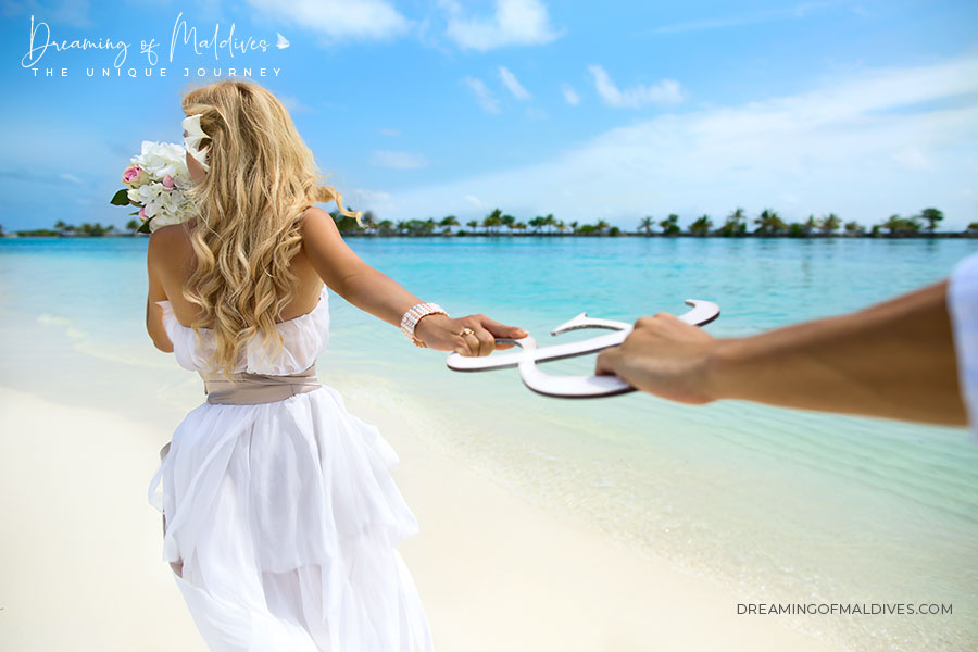 A Dreamy Wedding in Maldives on your own private Island. Couple married in Paradise