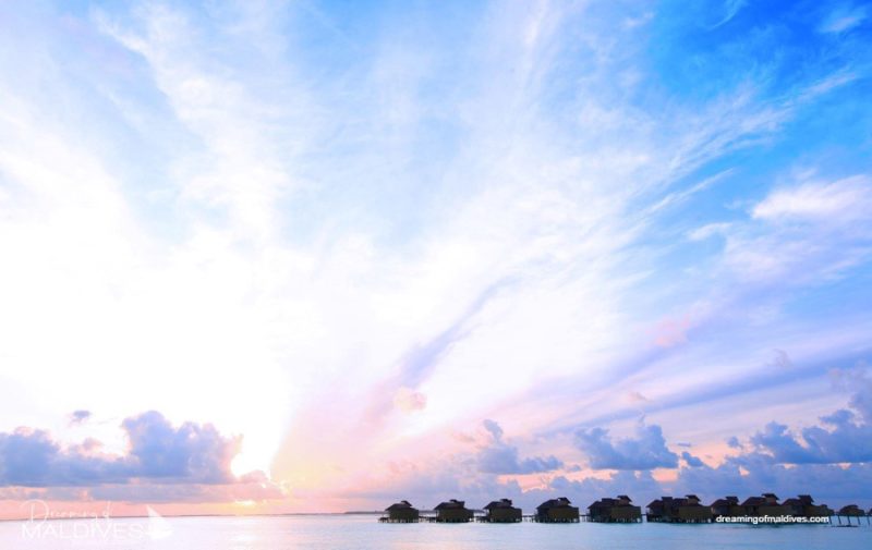 Six Senses Laamu water villas at sunset