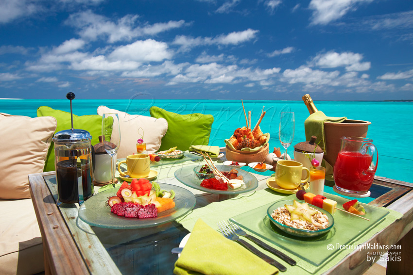 six senses laamu water villa deck breakfast