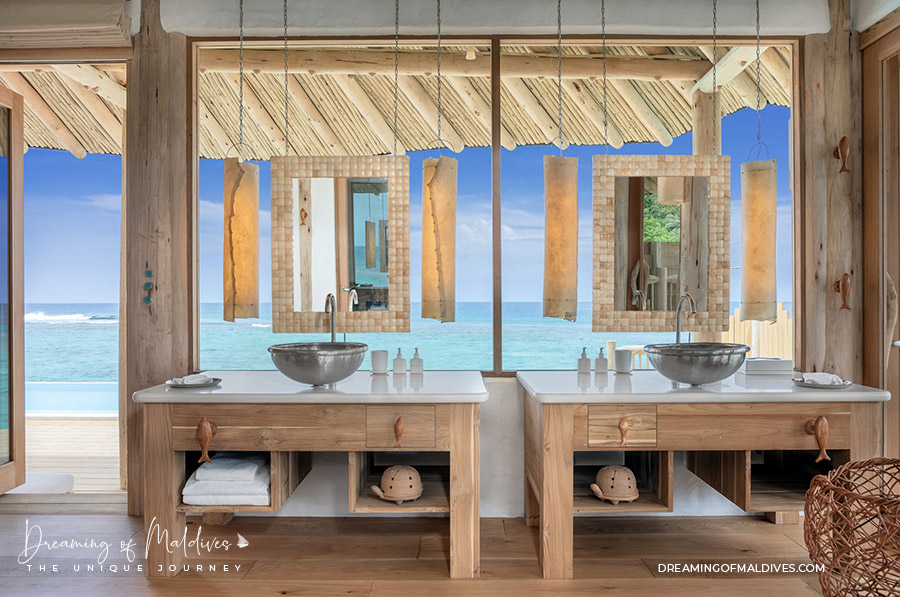 2 Bedroom Water Retreat with Slide Bathroom with Lagoon View. Photo © Soneva