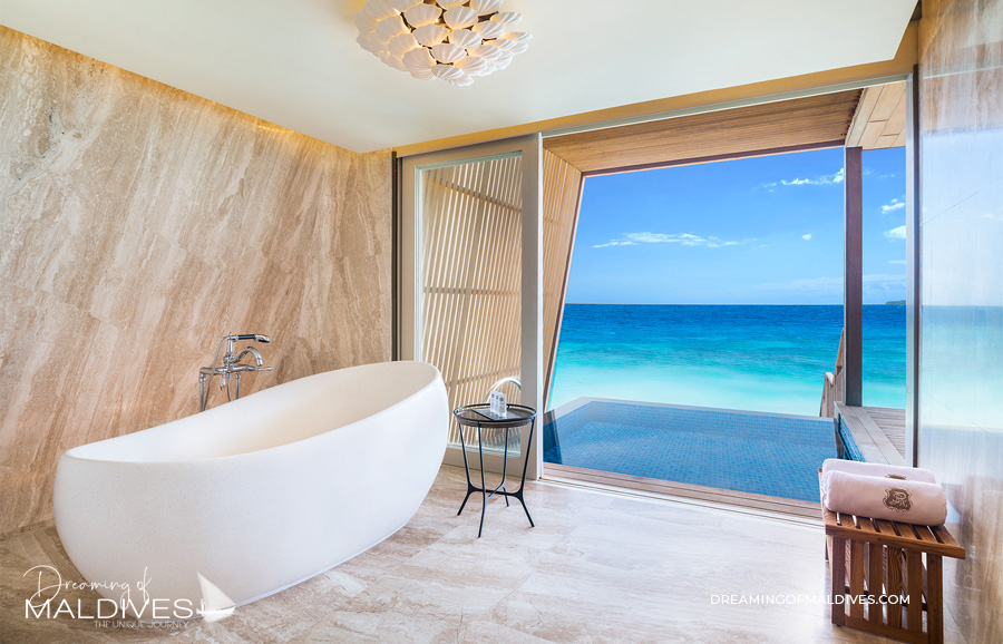 Bathroom with open views onto the lagoon at St Regis Vommuli Maldives resort