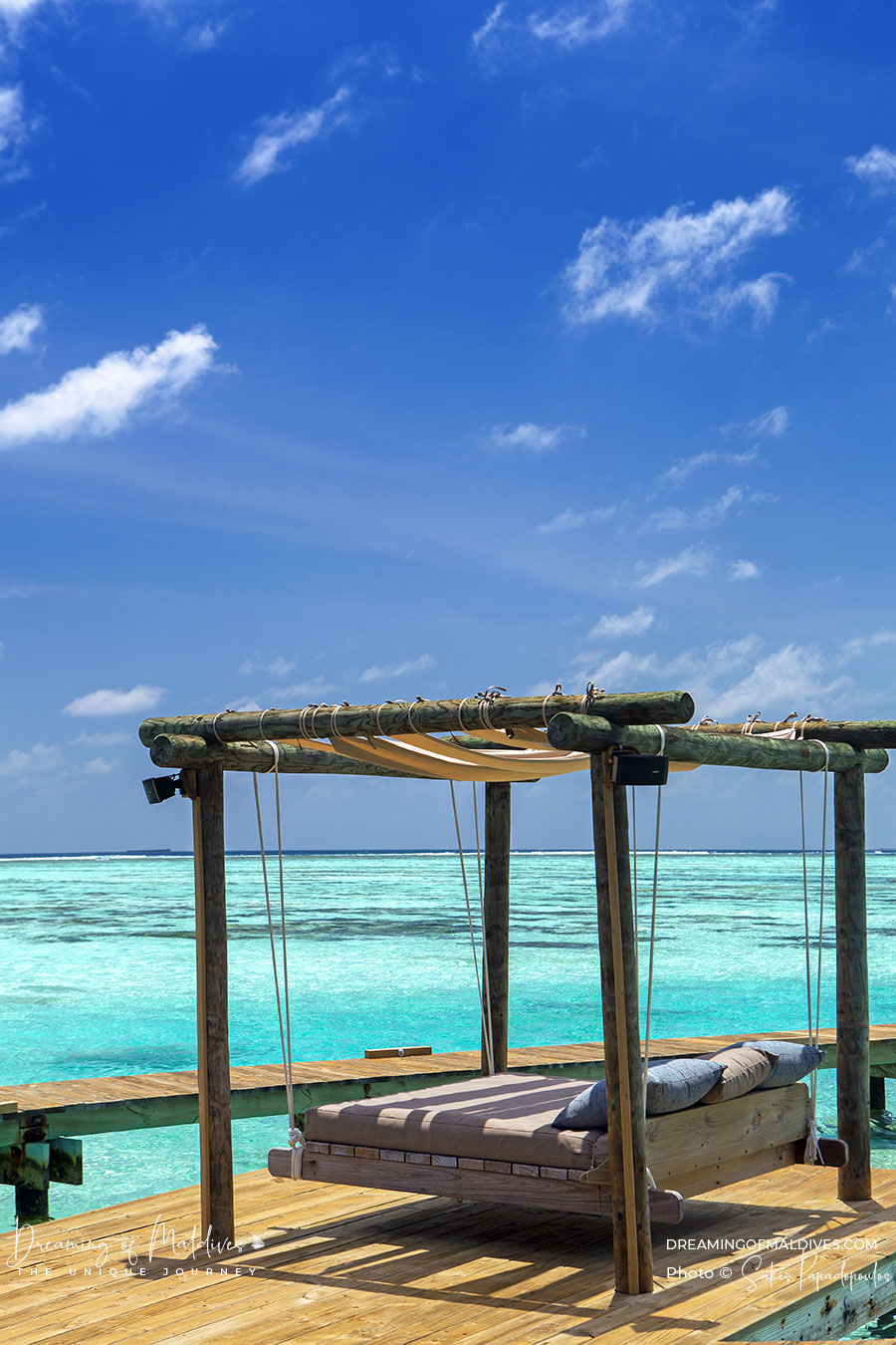 Private reserve gili relaxing swing on the big seafront deck