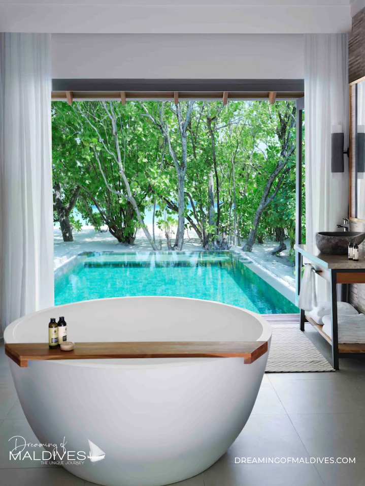 Beach Villa With Pool Bathroom with a view at Vakkaru Maldives