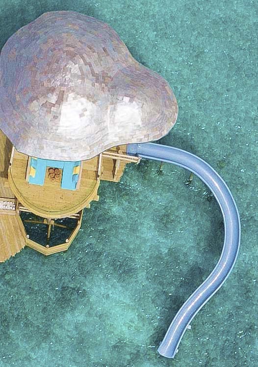 maldives restaurant with water slide at soneva fushi