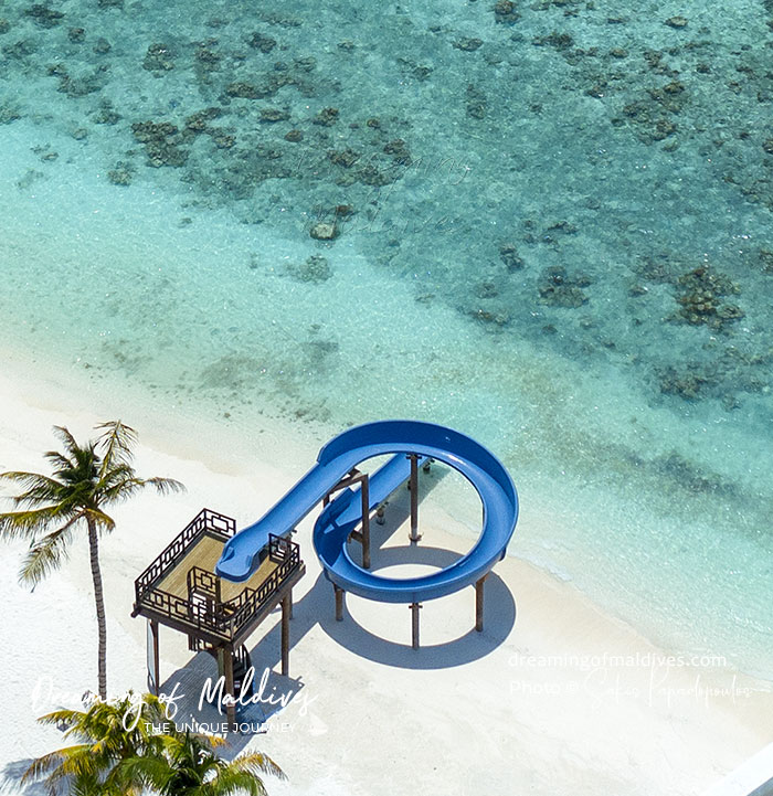 beach water slide oblu sangeli maldives resort