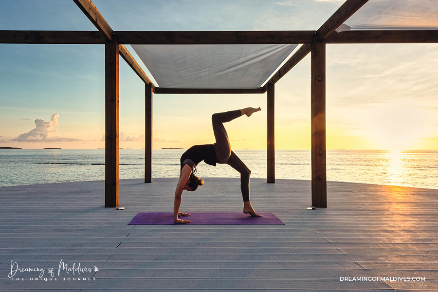 Maldives Sunset Yoga at Mövenpick Resort Kuredhivaru overwater sala